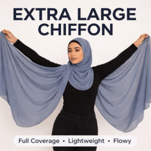 Woman holding out an extra large chiffon hijab to show full coverage and drape